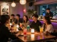 Friends enjoying vibrant cocktails at 상봉동 한국관나이트 in a stylish nightlife setting.
